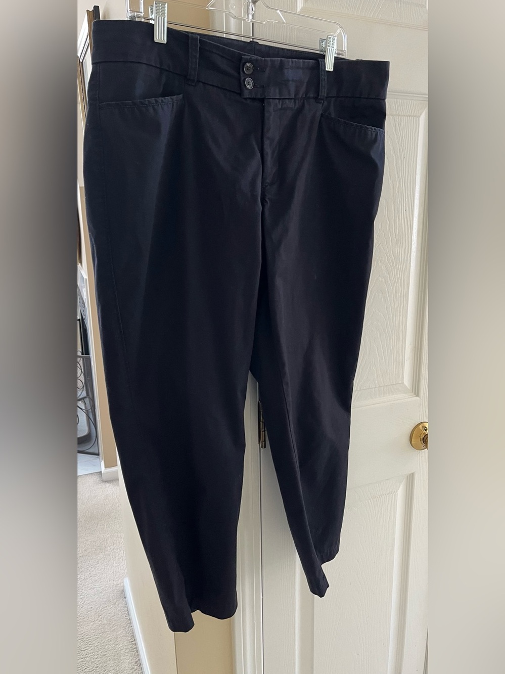 Ladies Dockers classic Black pants
 76% cotton 20% polyester 4% elastane
Size 14